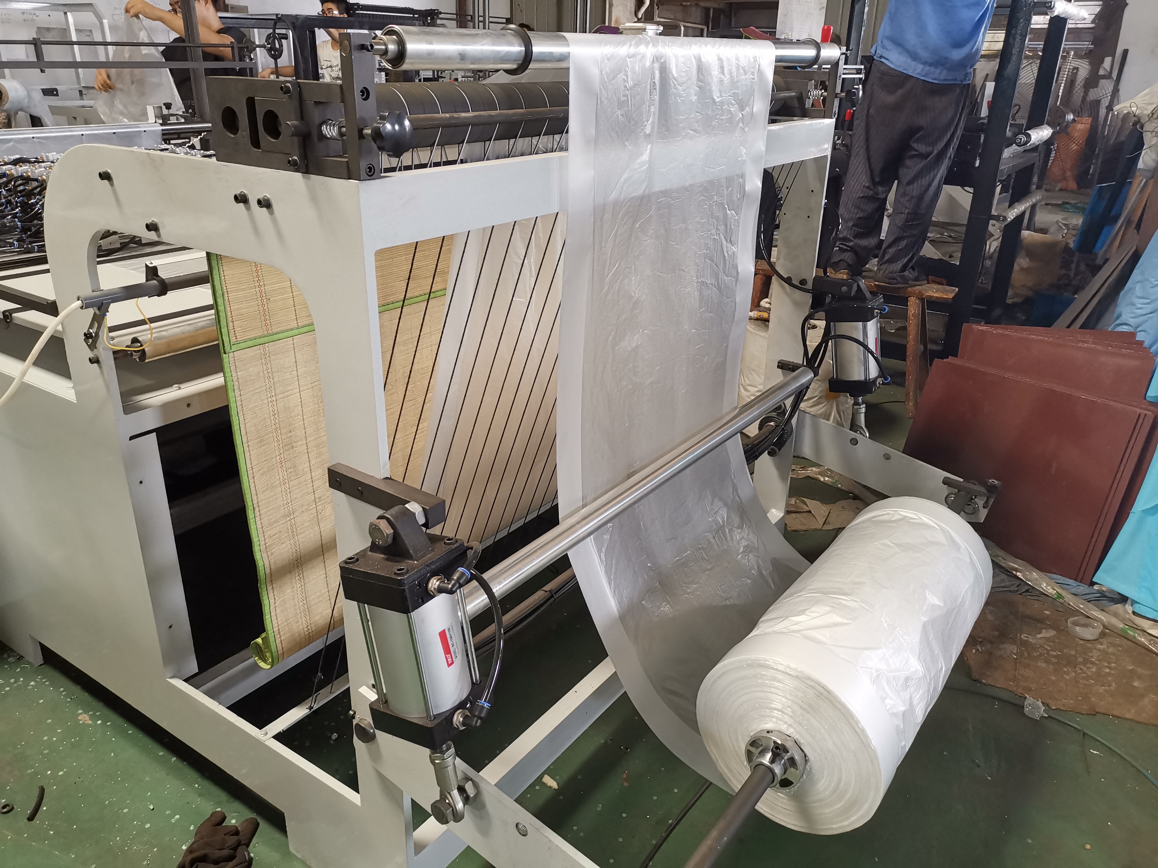 FULLY AUTOMATIC MULTI HOLE BOTTOM SEALING BAG MAKING MACHINE
